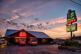 Big Bob Gibson Bar-B-Q in Decatur, Alabama is a legendary barbecue joint that has been serving up delicious, mouth-watering barbecue for over 90 years. Known for their signature dishes like smoked chicken, pork shoulder, and ribs, Big Bob Gibson Bar-B-Q has won numerous awards and accolades for their exceptional barbecue.