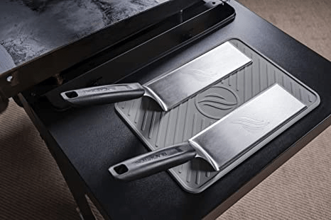 A pair of spatulas is essential for cooking on a griddle. Using two spatulas instead of one gives you more control and allows you to manipulate the food on the cooking surface more easily and efficiently.