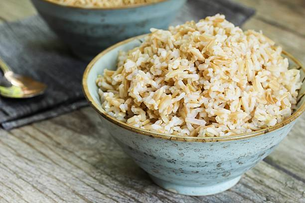 Brown rice is a whole-grain rice that is a healthier alternative to white rice. It is chewy, nutty, and has a slightly sweet flavor. Brown rice is often used in salads, stir-fries, and pilafs, as well as in soups and stews.