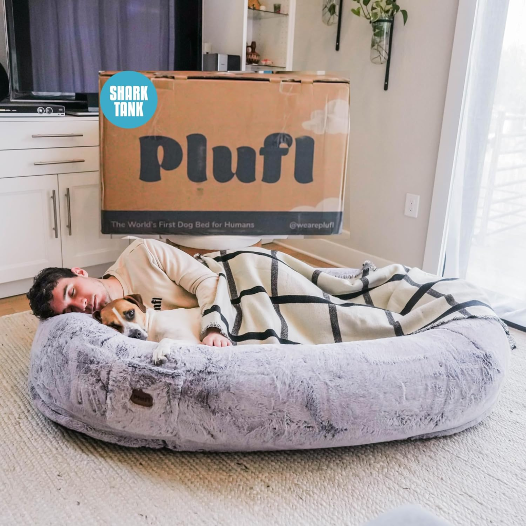 This human-sized dog bed, known as Plufl, is not just a bed; it's a sanctuary for relaxation. Endorsed by Mark and Lori on Shark Tank, it features orthopedic gel-infused memory foam, plush pillow bolsters, and a side pocket for easy storage.